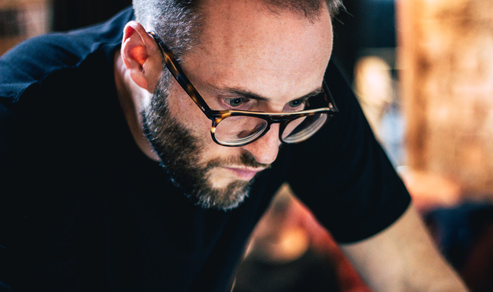 An archive photograph of Carl working on miPic